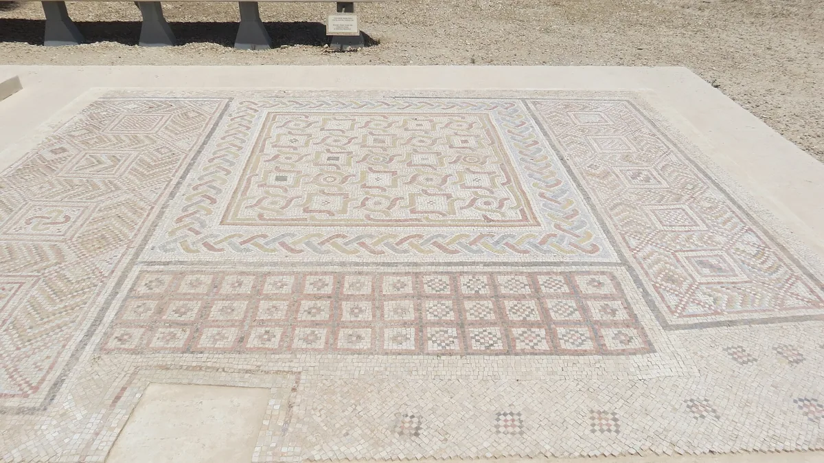 A Byzantine geometric mosaic floor displayed outdoors at the Good Samaritan Museum