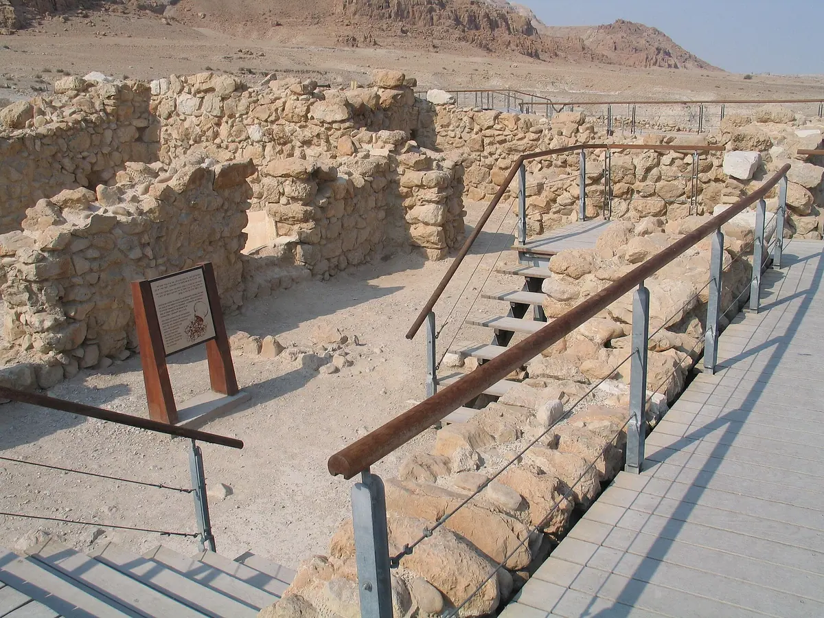 Stone ruins and a visitors' walkway at Qumran National Park